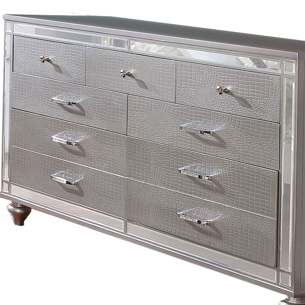 Contemporary Wooden Dresser with 9 Drawers and Turned Legs, Silver